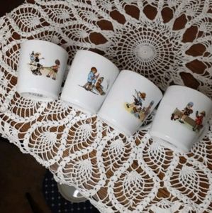Pier 1 mugs Children at Play made in Germany. One set of 4 mugs.